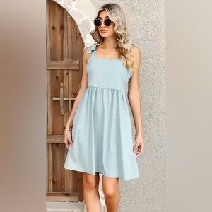 NWOT- CLARISBELLE -Tie-Strap Sundress whit smocked back.